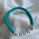 Pulsera Pucas Letra Dorada